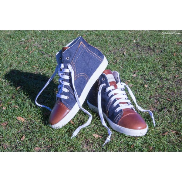 Handmade sneakers brown leather blue jeans